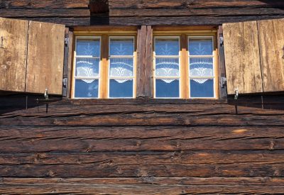 two-windows-of-a-wooden-hut-P8PWEJE